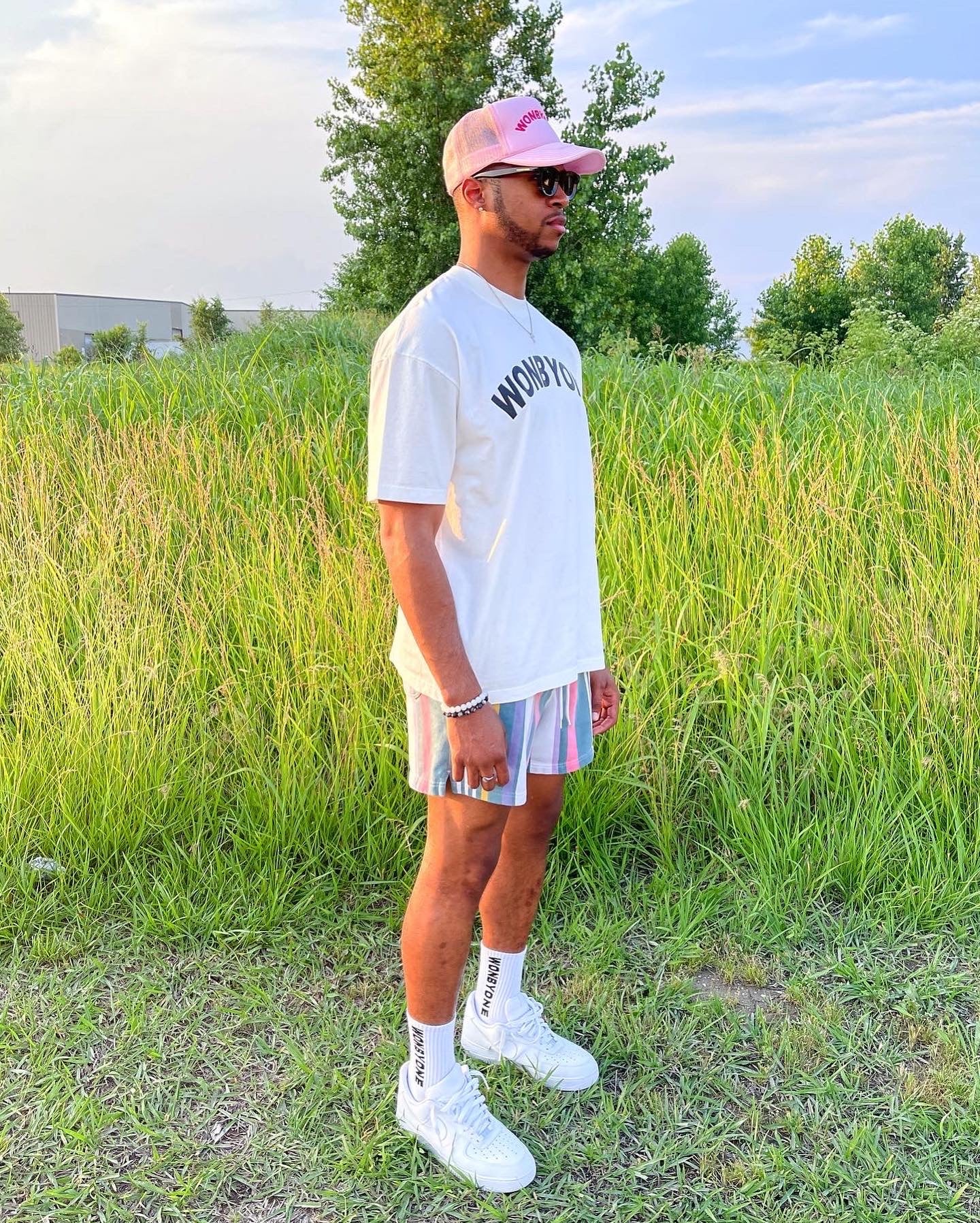 ARCHED LOGO TRUCKER HAT